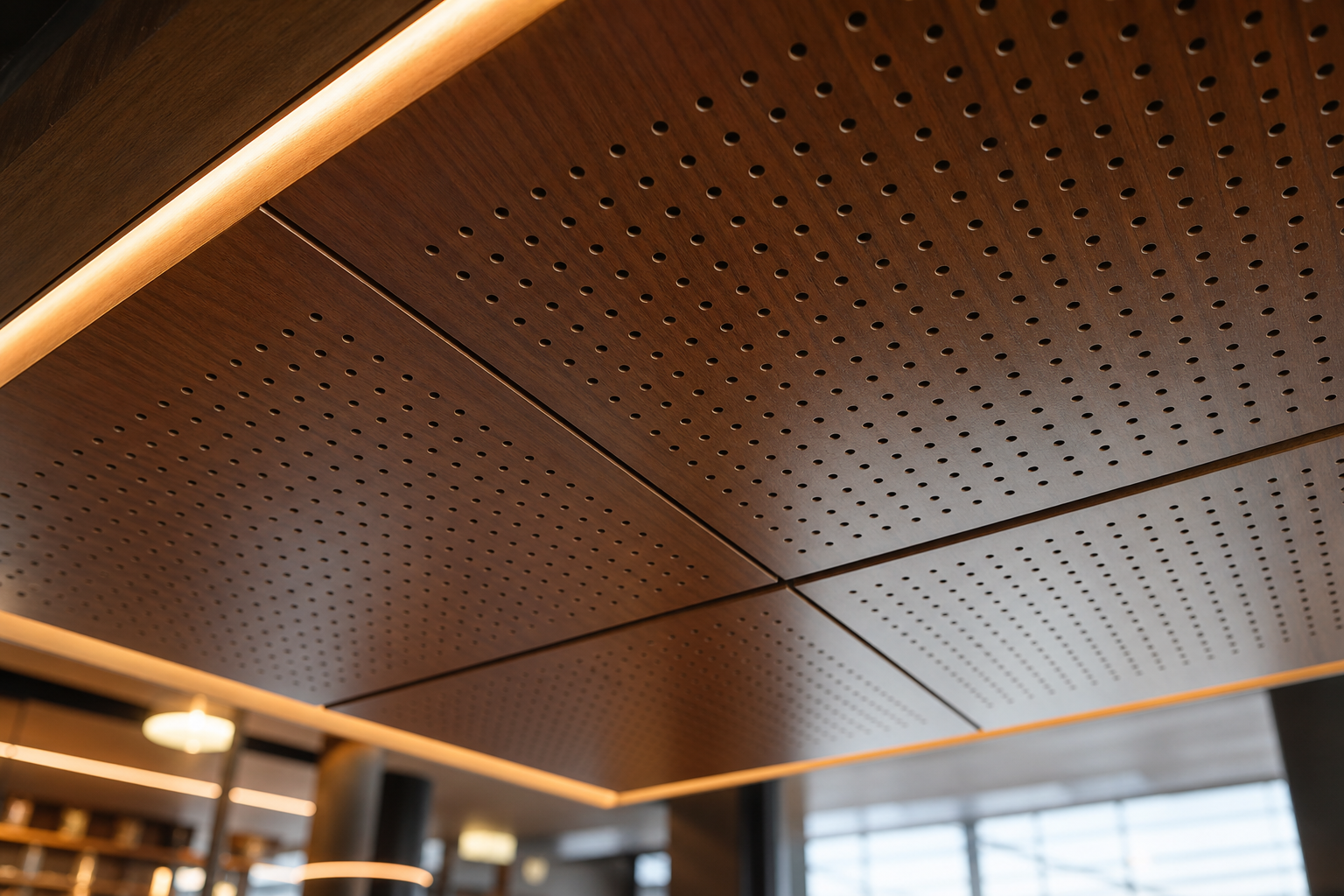 Close-up of Murano perforated acoustic timber ceiling panels showing decorative timber finish and acoustic perforation detail