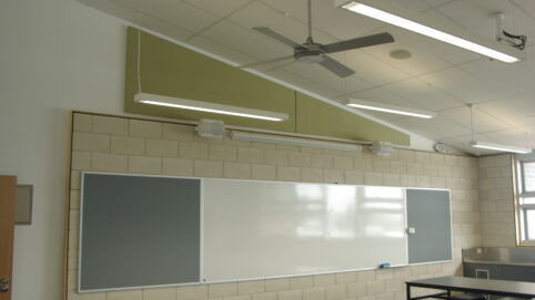 Lightweight SerenityLite Acoustic Ceiling Panels suspended to reduce echo and reverberation.