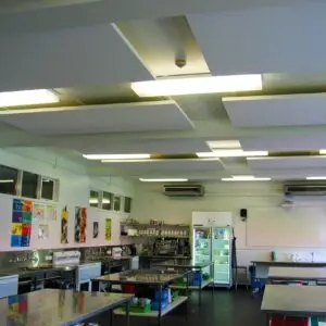 Sonofonic acoustic ceiling panels suspended in a commercial space, designed to absorb sound reflections and improve acoustic comfort.