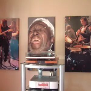 Serenity Acoustic Art Panel.Serenity Acoustic Art Panels withmusic-themed prints installed along a hallway wall.