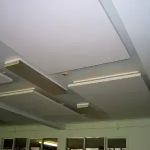 Lightweight SerenityLite Acoustic Ceiling Panels suspended to reduce echo and reverberation.