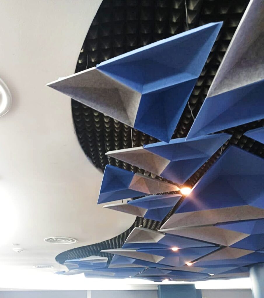 Suspended DecraCloud acoustic panels in modern open-plan office